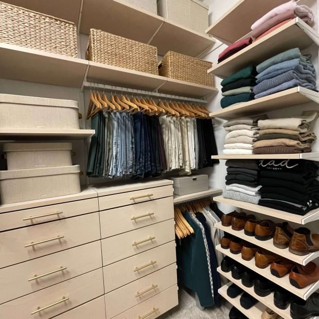 Custom closet system organized by category with matching hangers