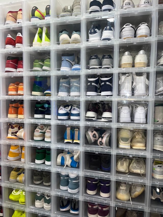 Shoes stored on vertical shelving in a small original Lakewood closet