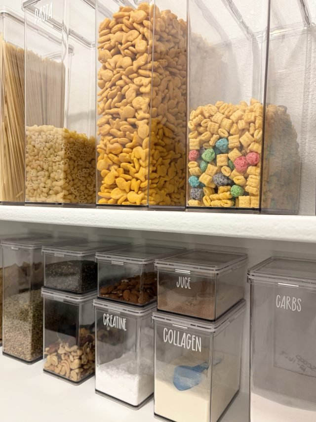 Tall clear cereal dispensers above labeled bins for juice, collagen and carbs