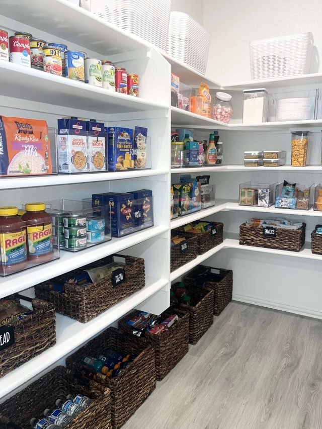 Pantry shelves reset with wicker baskets and clear labels during a maintenance visit