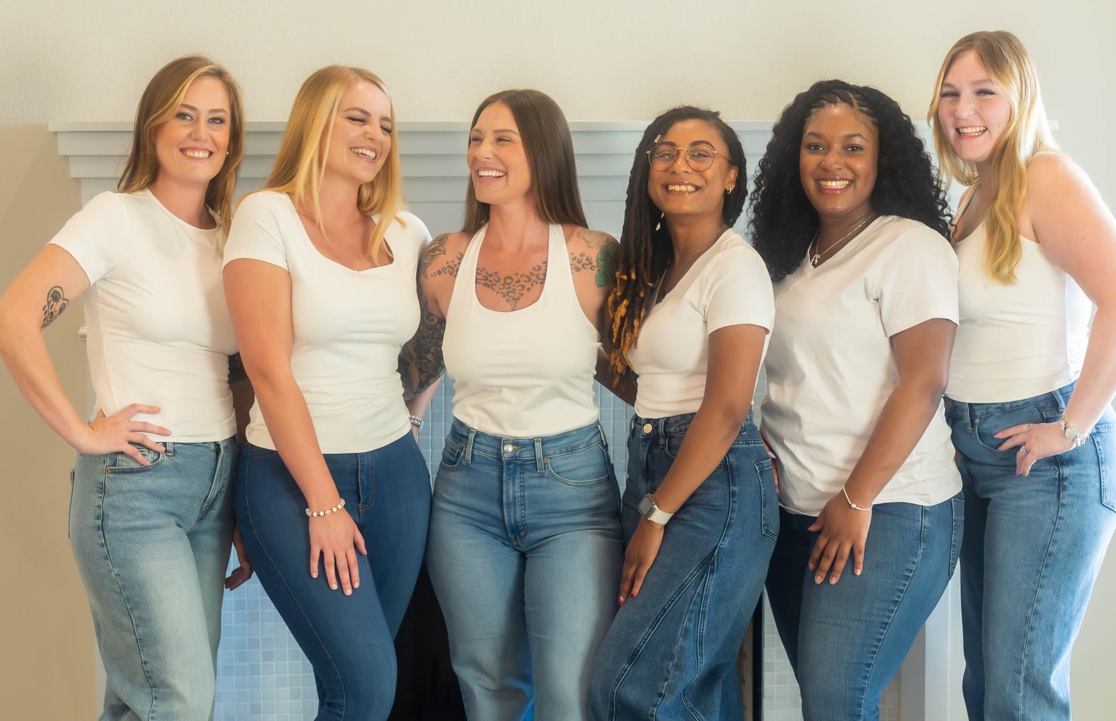 The Messy Buns Organized Spaces team of six professional organizers side by side in a Dallas-Fort Worth home